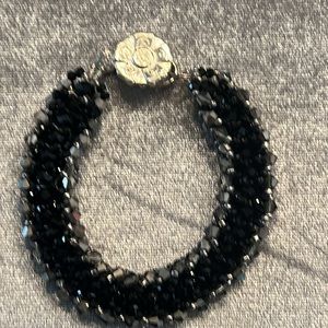 Hand crafted, beaded black and silver bracelet.